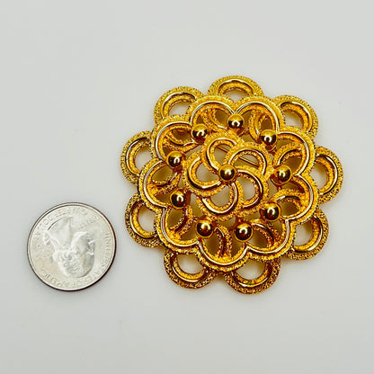 Large Monet gold tone mid century flower brooch