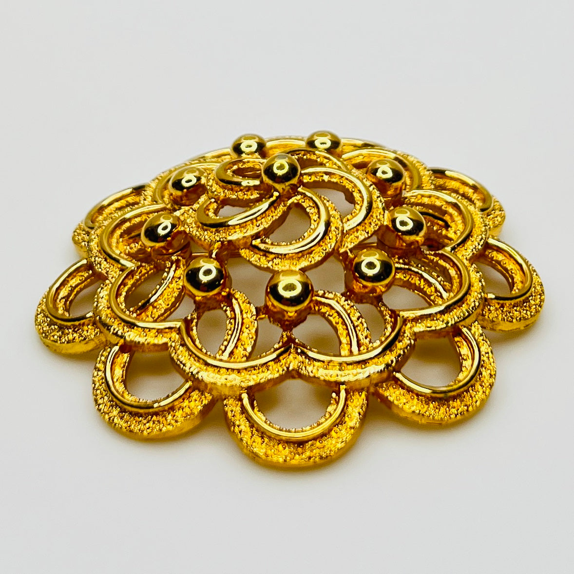 Large Monet gold tone mid century flower brooch