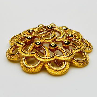 Dimensional gold floral Monet brooch 2.5 inches