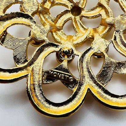 Back of signed Monet mid century gold brooch