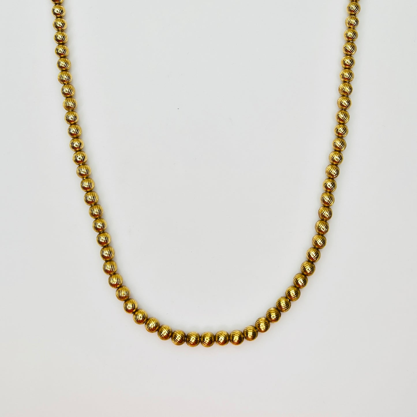 Monet vintage gold bead necklace textured 1970s long strand