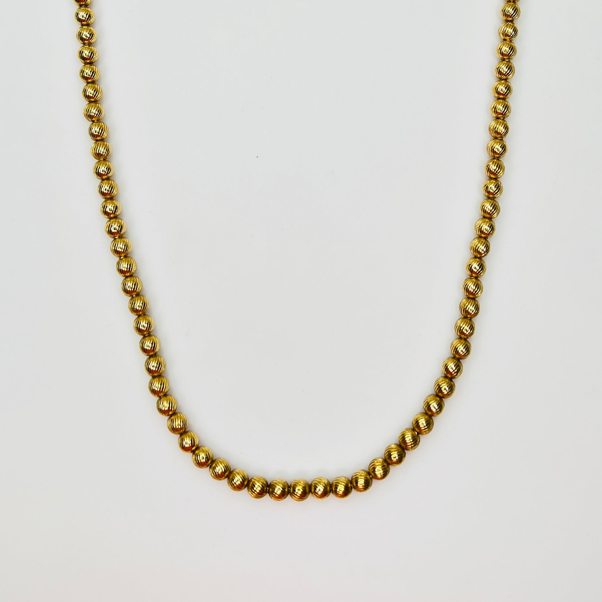 Monet vintage gold bead necklace textured 1970s long strand