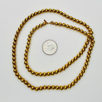 Monet vintage gold bead necklace textured 1970s long strand