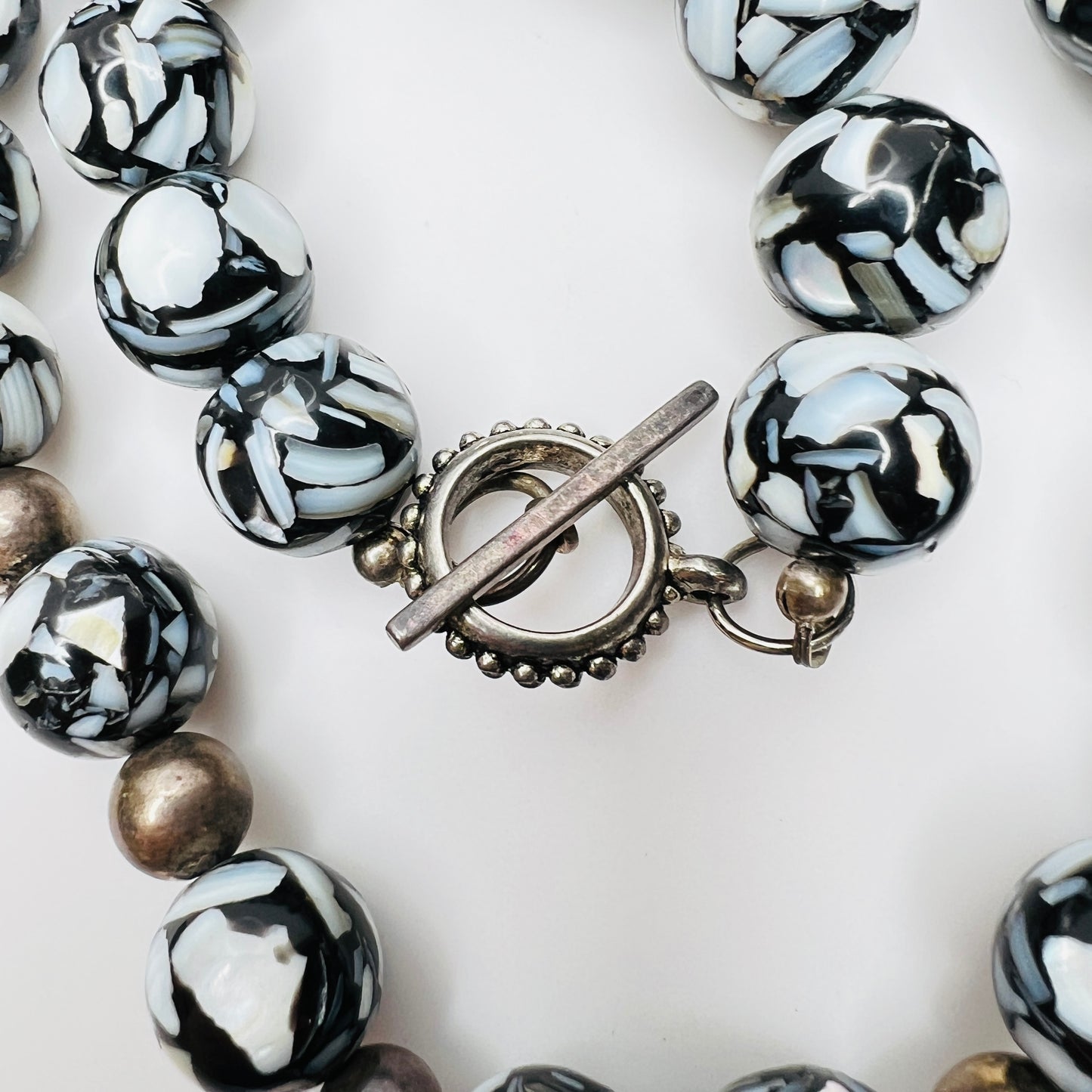 Toggle clasp detail with marbled glass beads