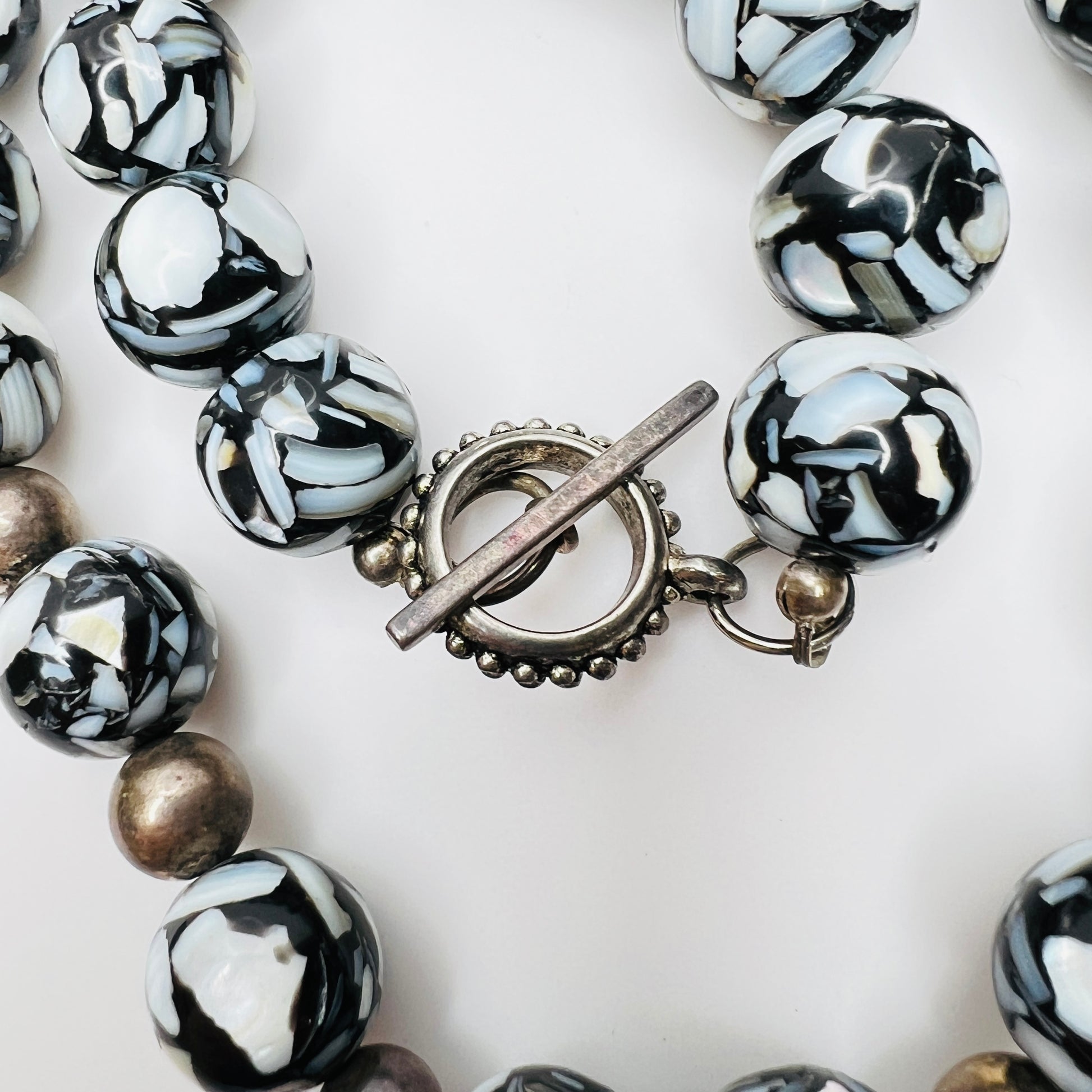 Toggle clasp detail with marbled glass beads