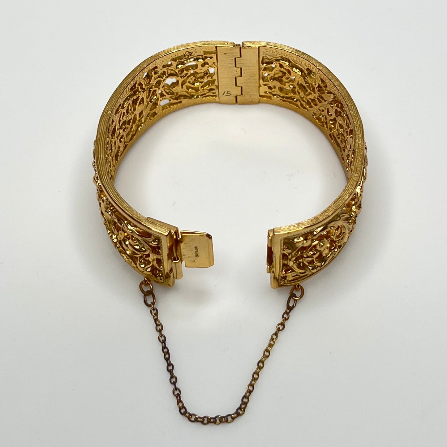 Vintage Napier gold filigree hinged bangle bracelet with safety chain