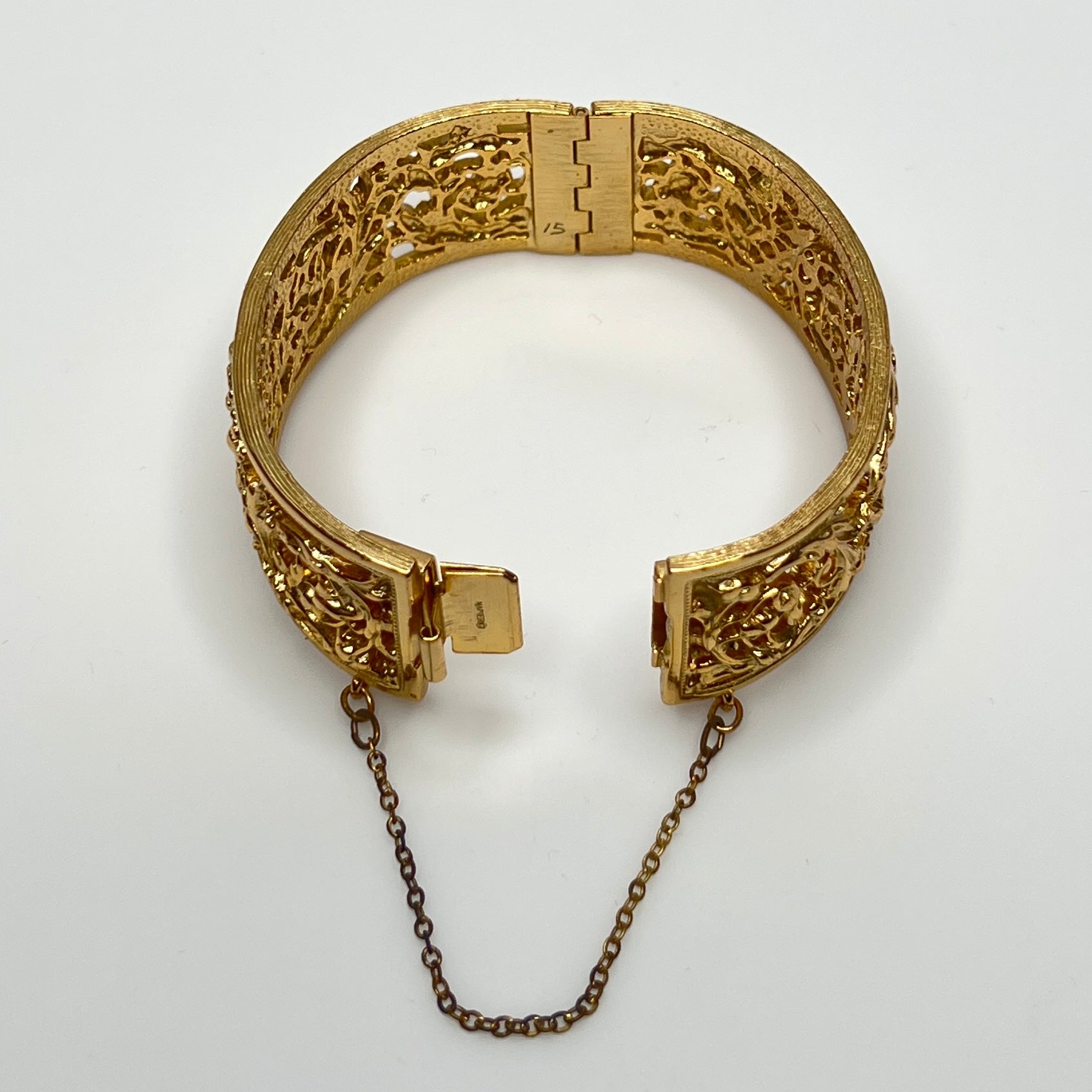 Vintage Napier gold filigree hinged bangle bracelet with safety chain