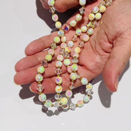 Video Detail of faceted AB beads and bicone crystals 1950s necklace with gold spacers