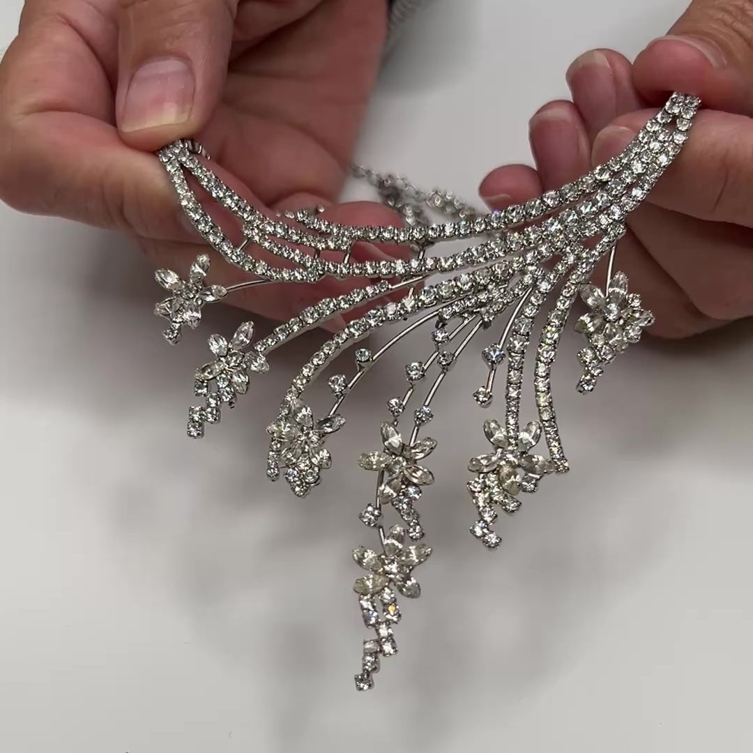 Vintage clear rhinestone bib necklace with cascading floral spray design