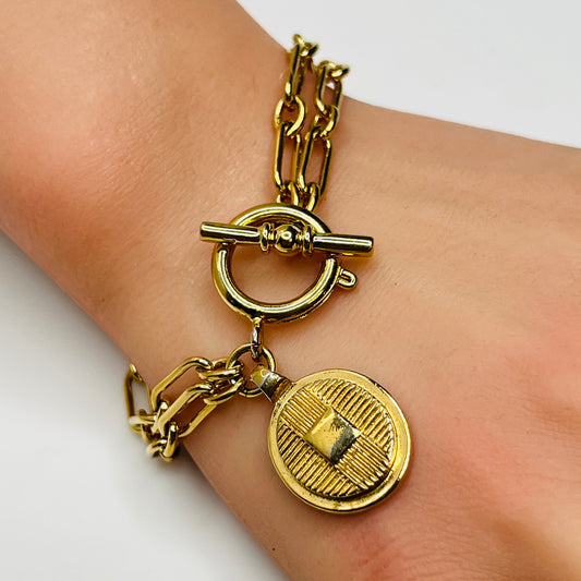 Gold-plated Ralph Lauren charm bracelet with double chain and toggle clasp