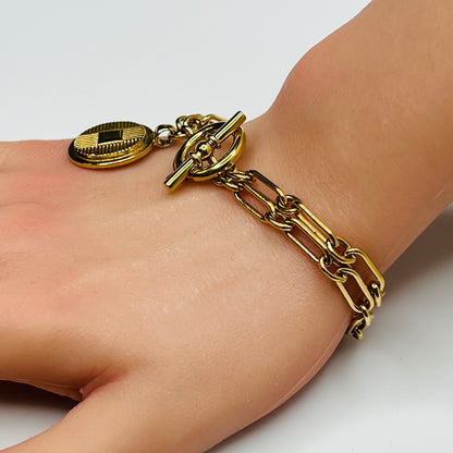 Signed Ralph Lauren Y2K-era bracelet with medallion charm detail