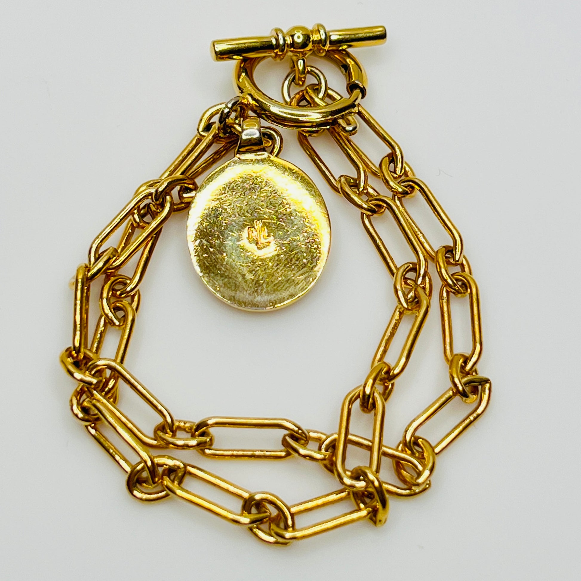 Gold-plated Ralph Lauren charm bracelet with double chain and toggle clasp