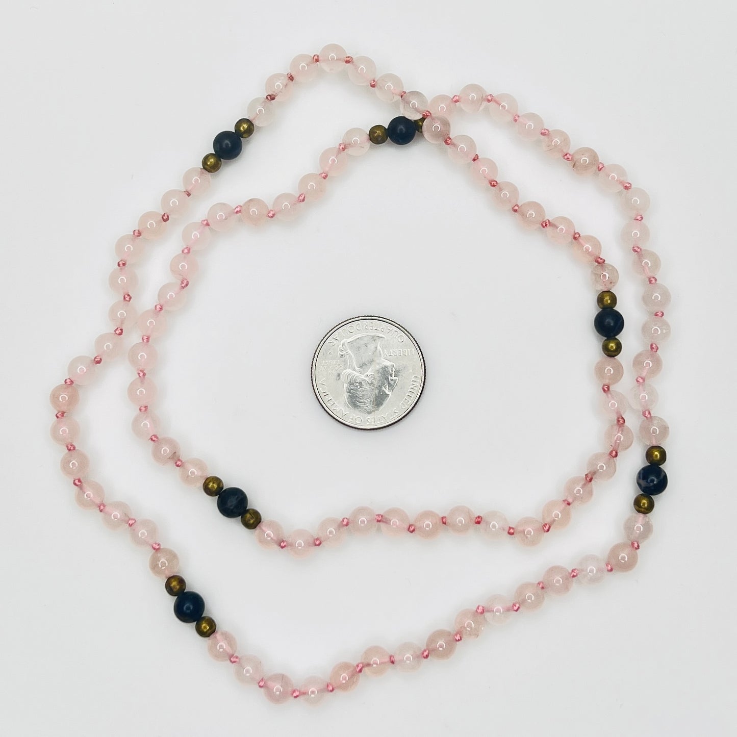 Hand knotted rose quartz and lapis bead necklace