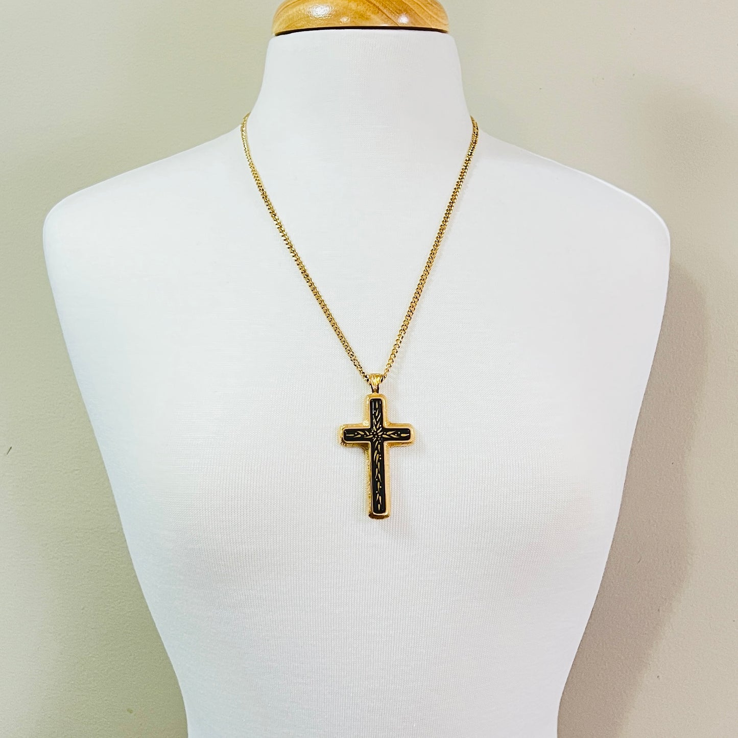 Vintage Sarah Coventry cross necklace shown on mannequin bust
