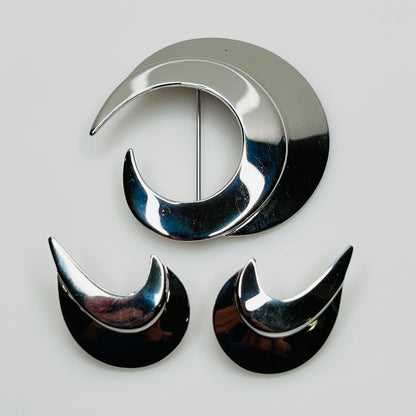 Vintage silver-tone crescent moon brooch and earrings set by Sarah Coventry