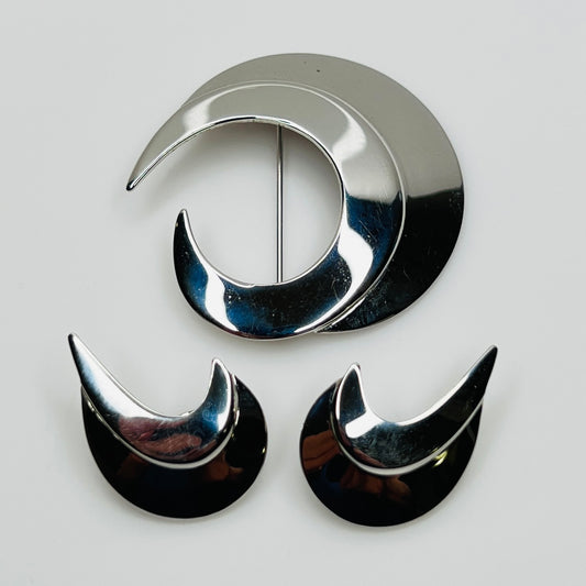 Vintage silver-tone crescent moon brooch and earrings set by Sarah Coventry