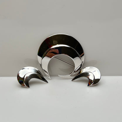 Vintage silver-tone crescent moon brooch and earrings set by Sarah Coventry
