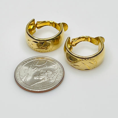 Sarah Coventry gold-tone etched hoop earrings with leaf design