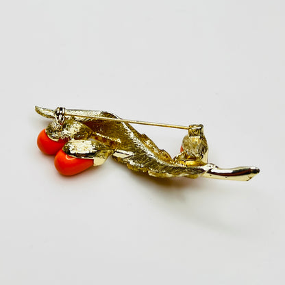 Reverse of brooch with Sarah Coventry signature on gold-tone metal