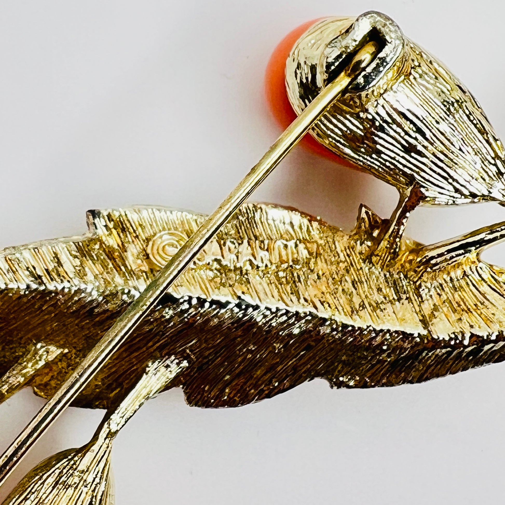 Reverse of brooch with Sarah Coventry signature on gold-tone metal