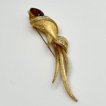 Gold-tone calla lily brooch with amber rhinestone and clear accents, signed Sarah Coventry