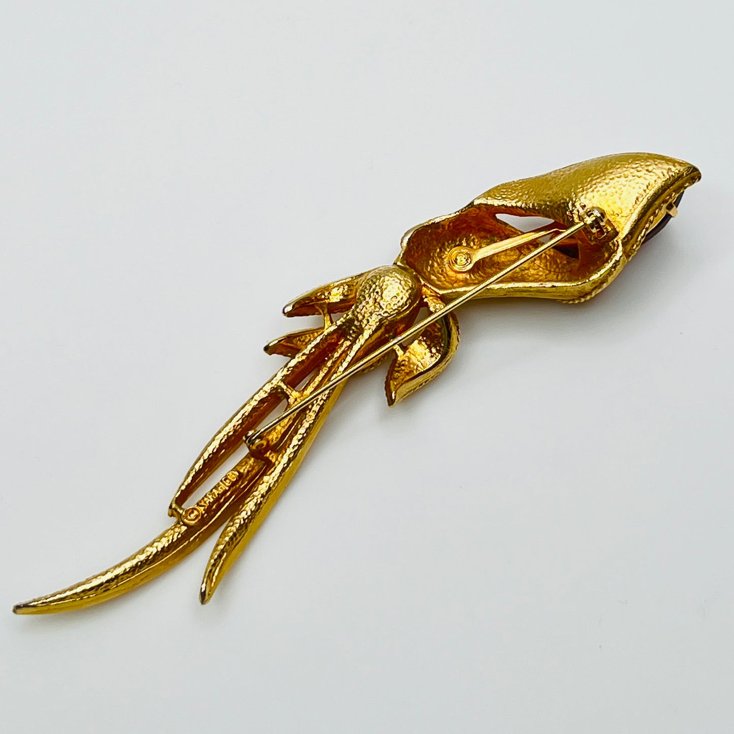 Gold-tone calla lily brooch with amber rhinestone and clear accents, signed Sarah Coventry