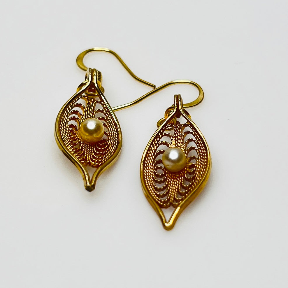 Upcycled vintage earrings with delicate leaf design and gold ear wires