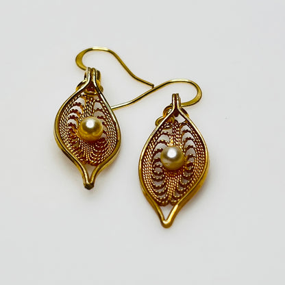 Upcycled vintage earrings with delicate leaf design and gold ear wires