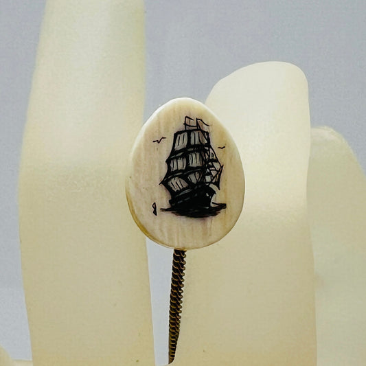 Vintage scrimshaw tie tack with sailing ship on ivory oval
