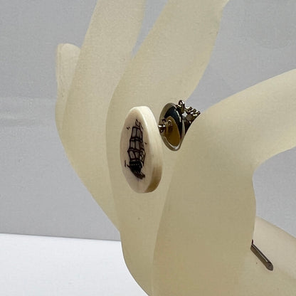 Vintage scrimshaw tie tack with sailing ship on ivory oval