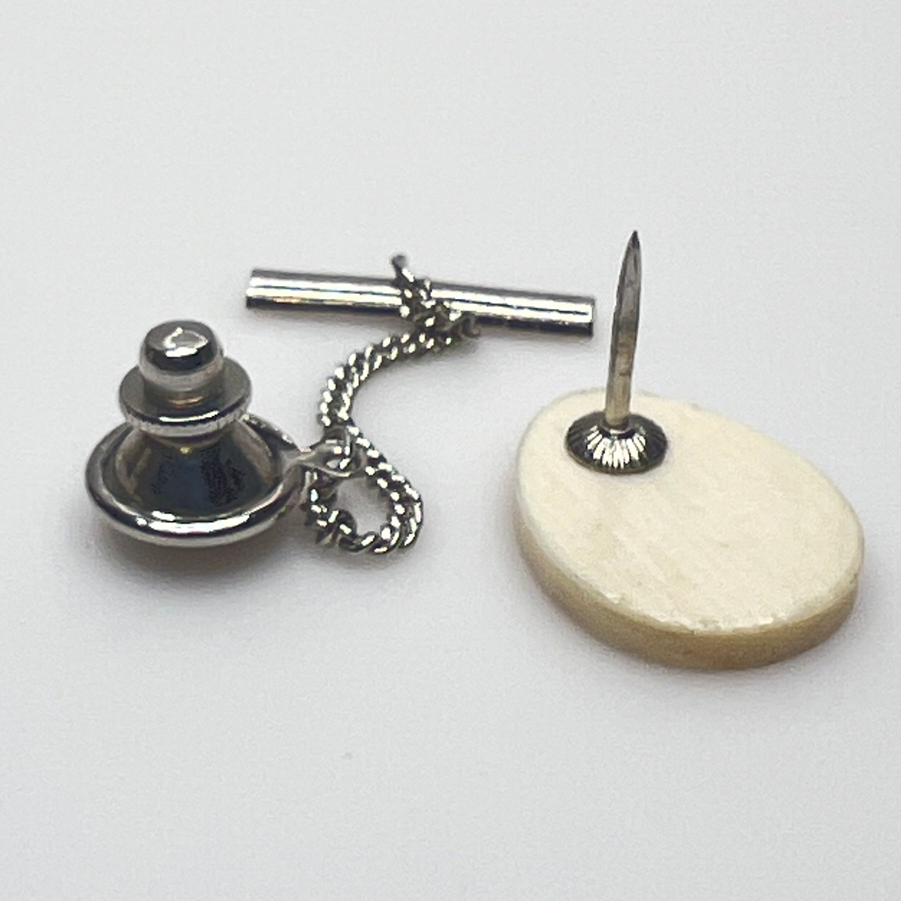 Estate tie tack with hand-etched tall ship design