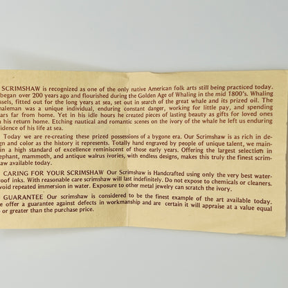 Beige card with text about New England scrimshaw 