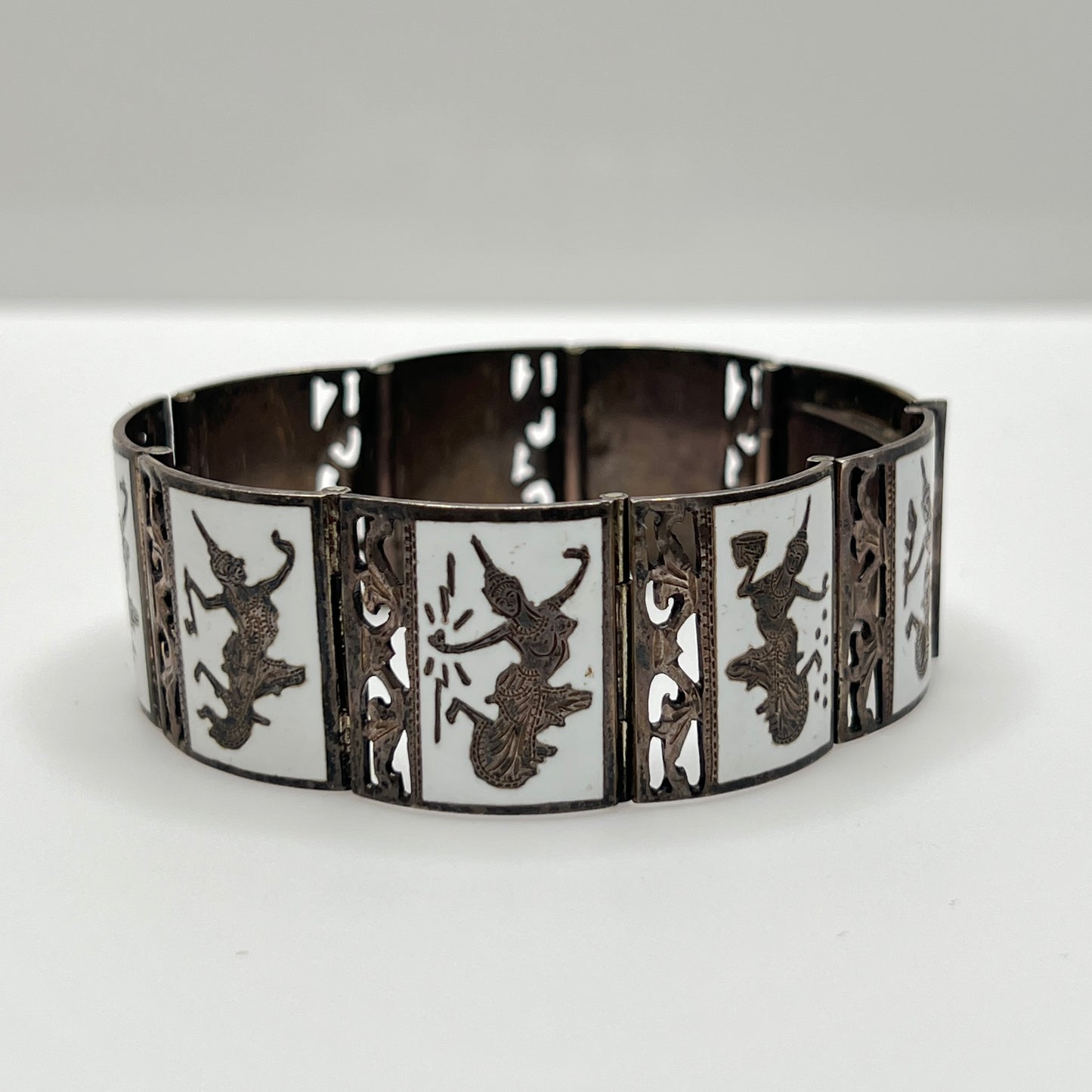 Vintage Siam silver bracelet with white enamel dancing goddess panels