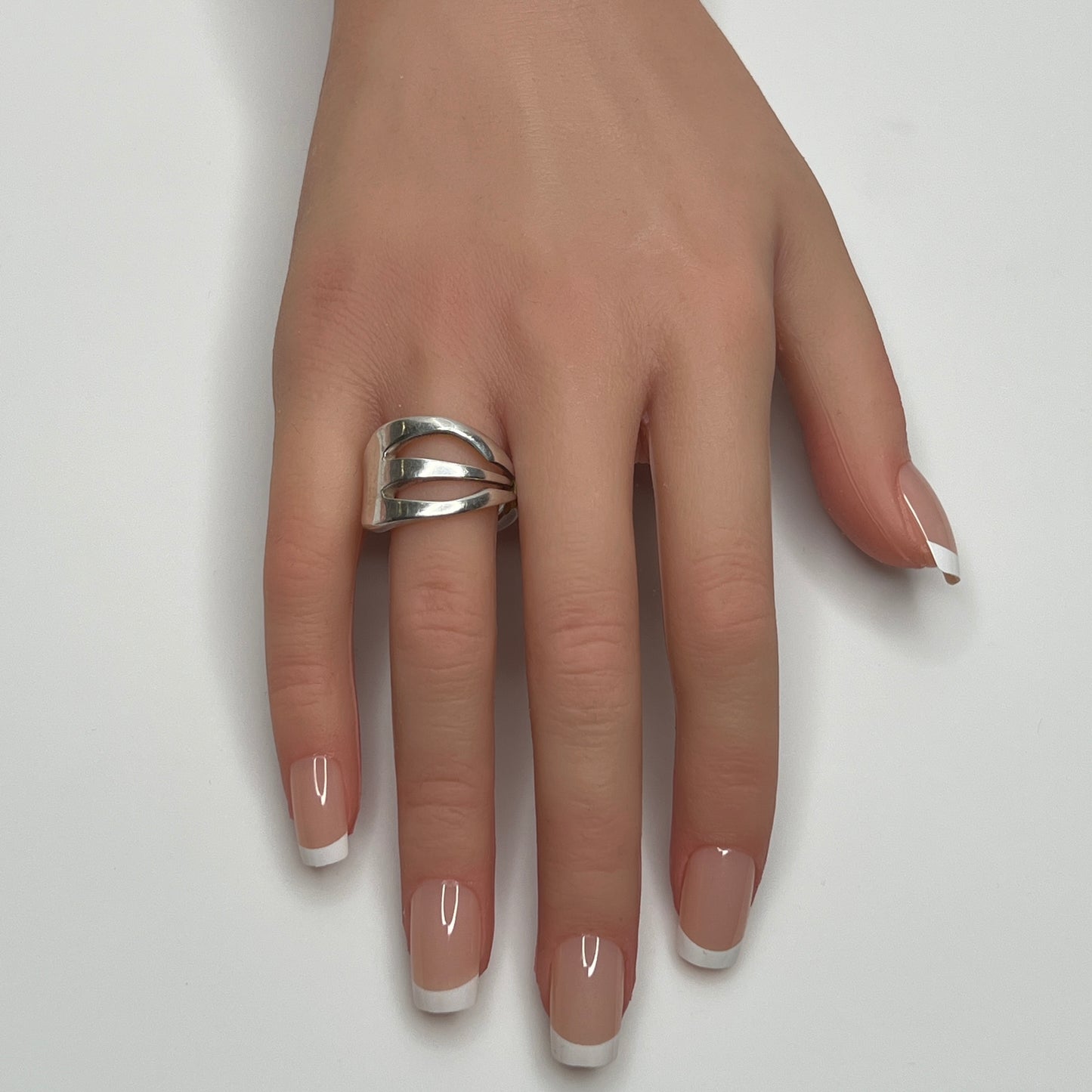 Vintage silver plated “Community” pickle fork ring with curved design