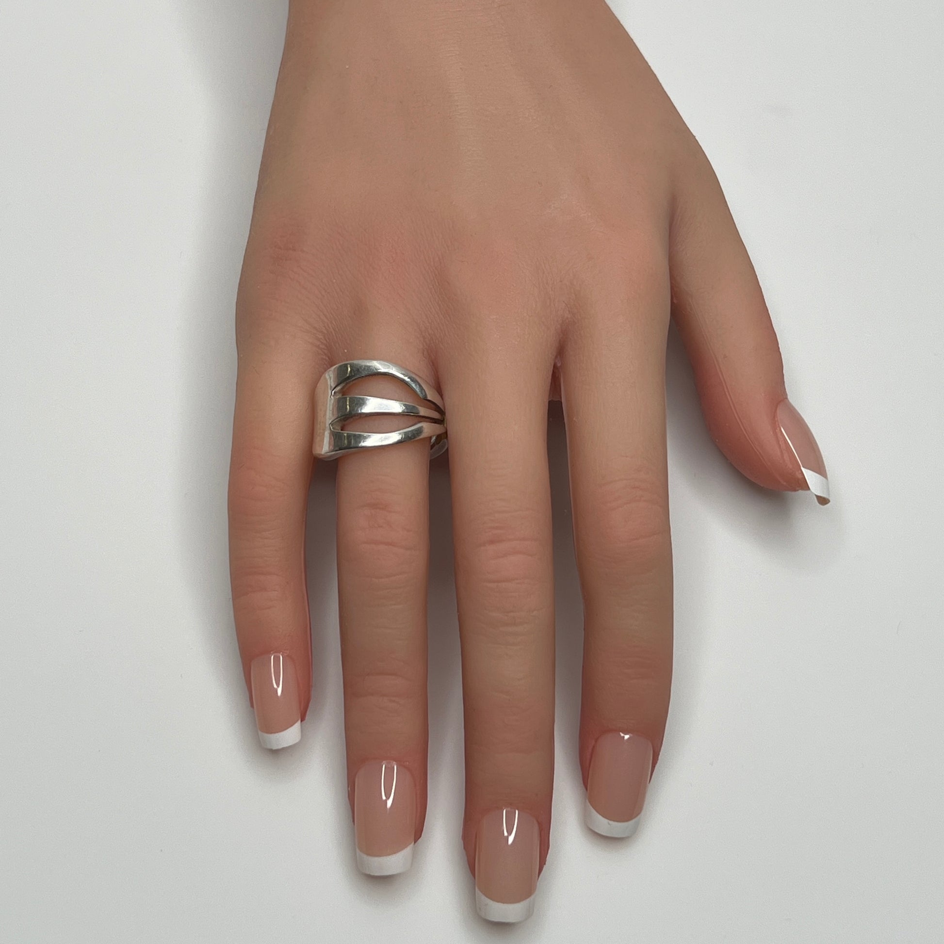 Vintage silver plated “Community” pickle fork ring with curved design