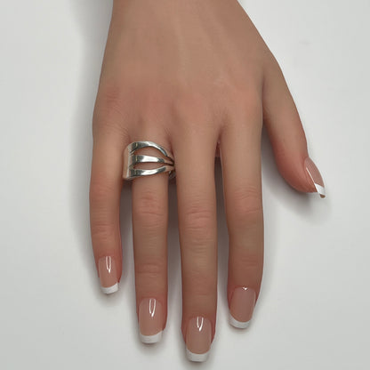 Vintage silver plated “Community” pickle fork ring with curved design