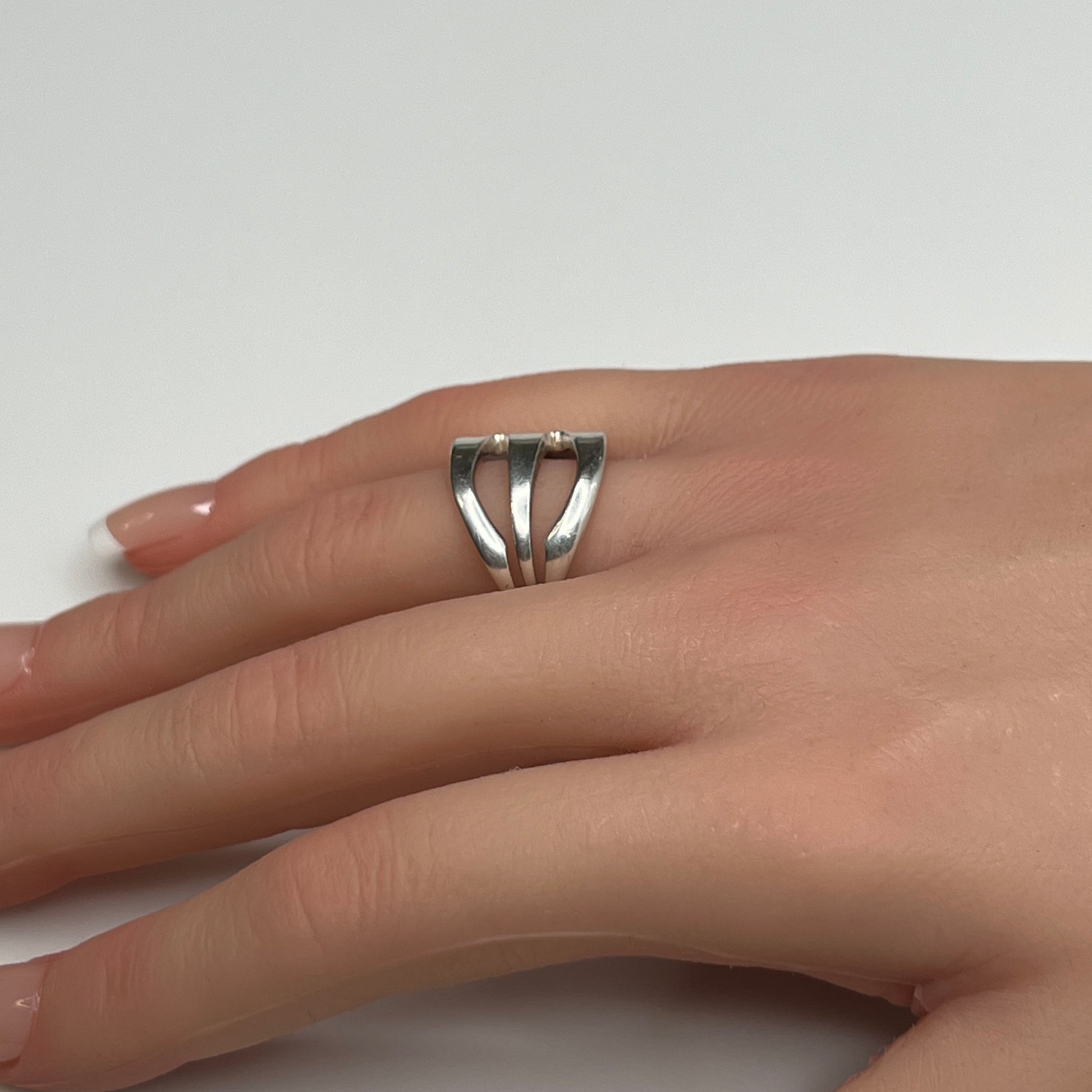 Vintage silver plated “Community” pickle fork ring with curved design