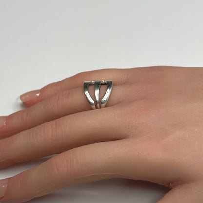 Vintage silver plated “Community” pickle fork ring with curved design