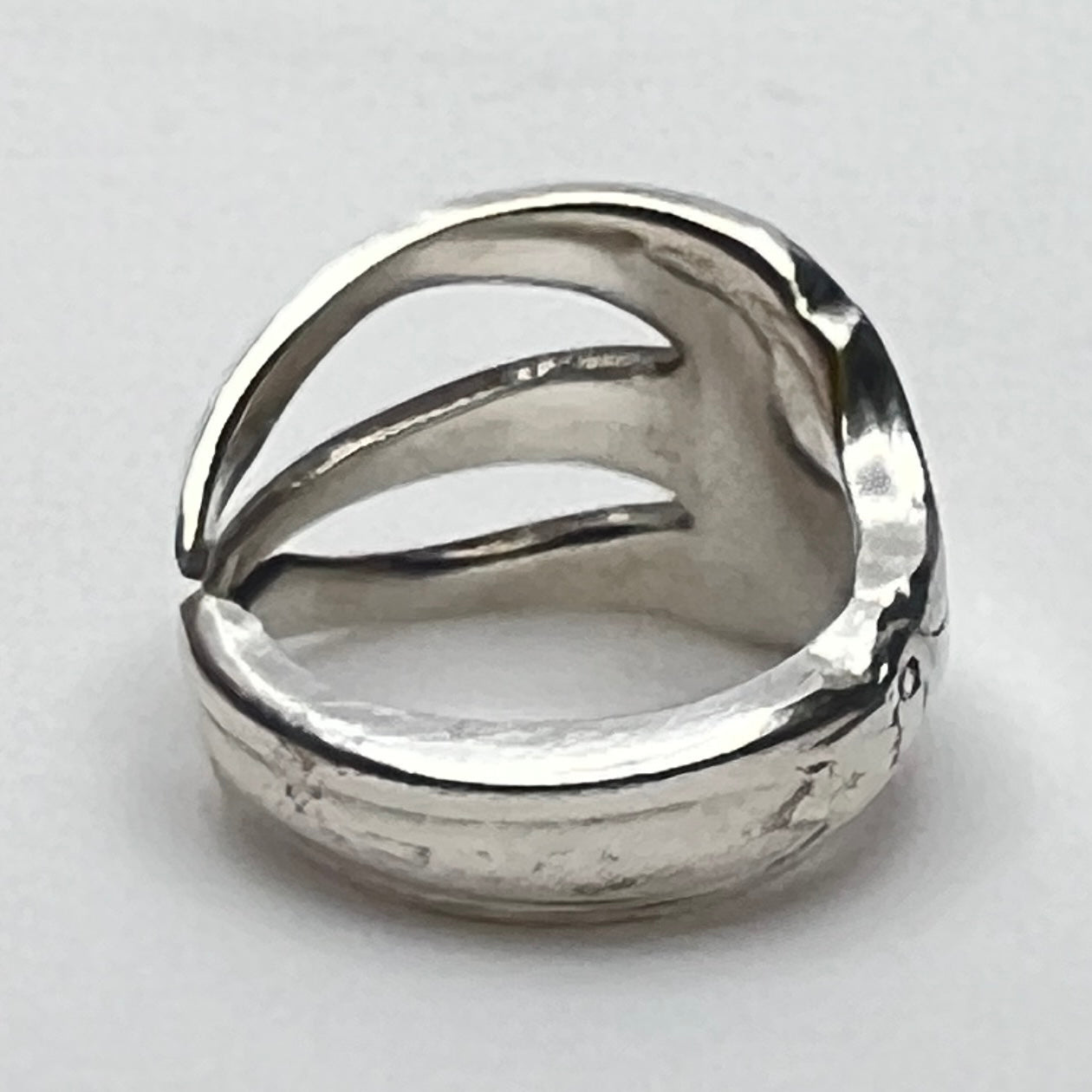 Upcycled silver fork ring on hand, size 8 with open tines
