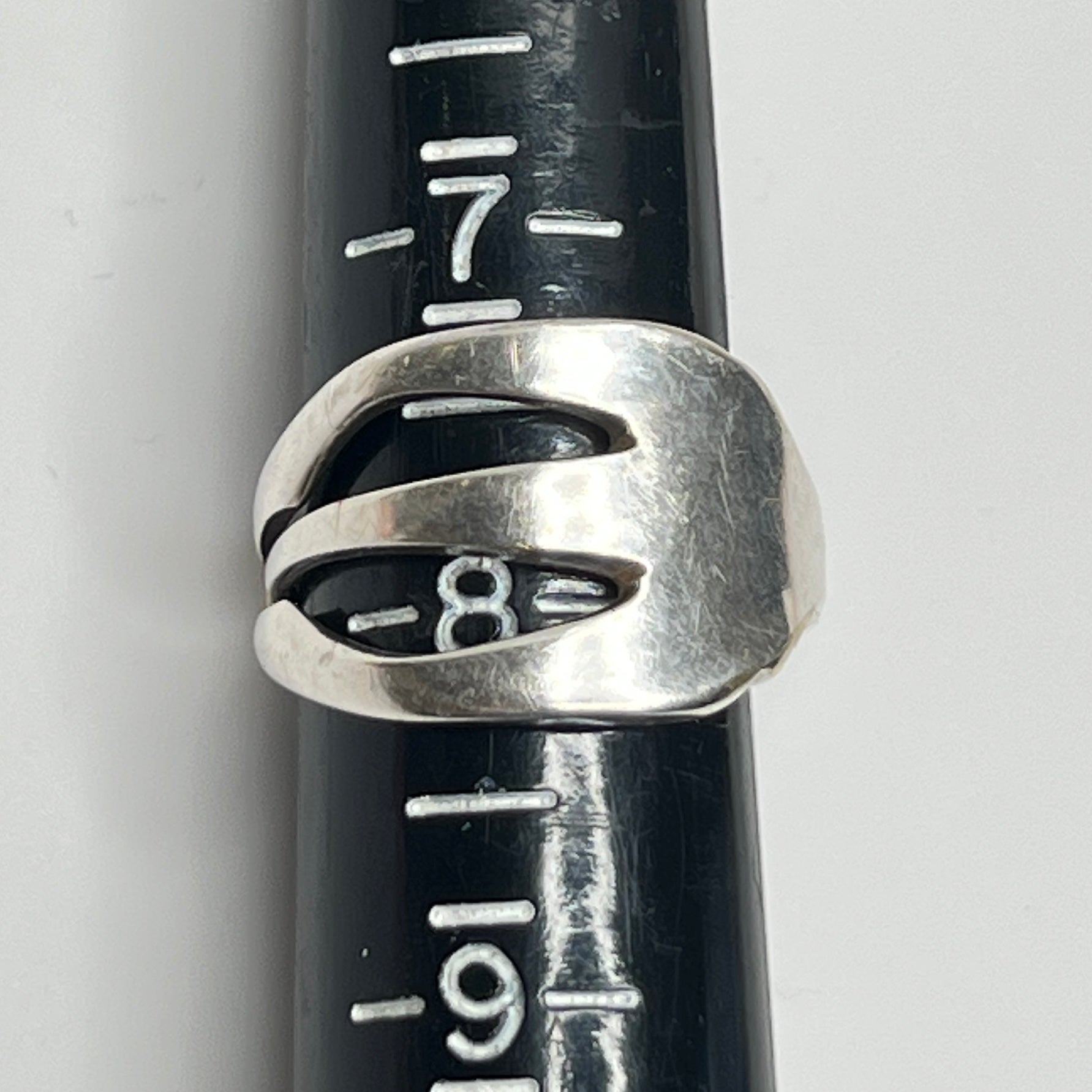 Upcycled silver fork ring on hand, size 8 with open tines