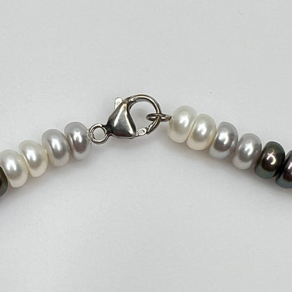 Sterling silver lobster clasp stamped 925 on cultured pearl necklace