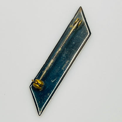 Back of sterling silver lapel pin stamped Sterling
