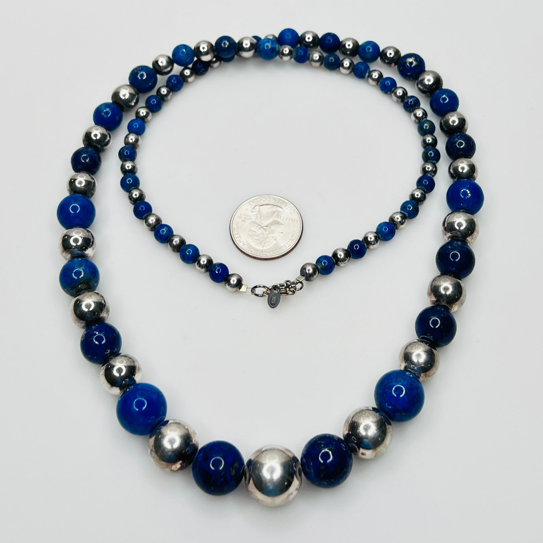 Vintage lapis lazuli necklace with sterling beads and coin for scale