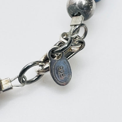 Close-up of 925 stamped clasp on sterling lapis bead necklace