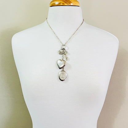 Sterling silver charm necklace with heart and oval lockets