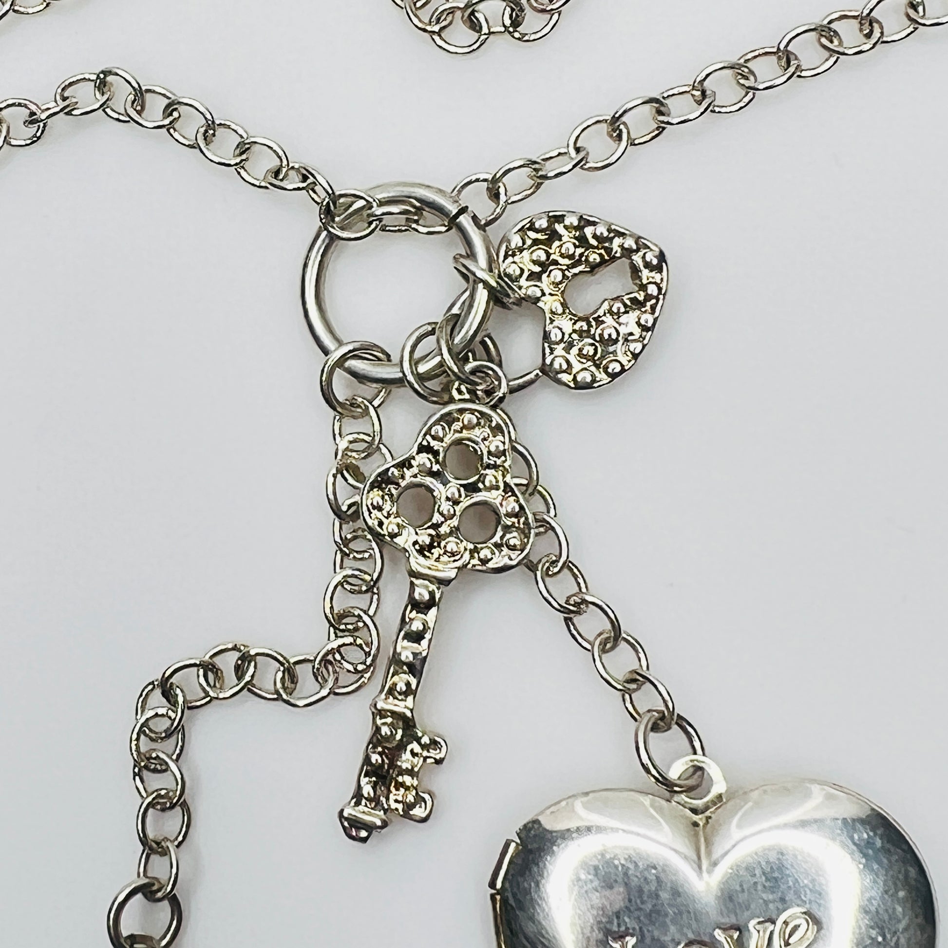 1990s silver charm necklace with key and lock details