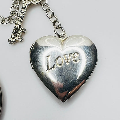 Close-up of heart locket engraved Love in sterling silver