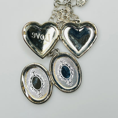 Sterling silver charm necklace with heart and oval lockets