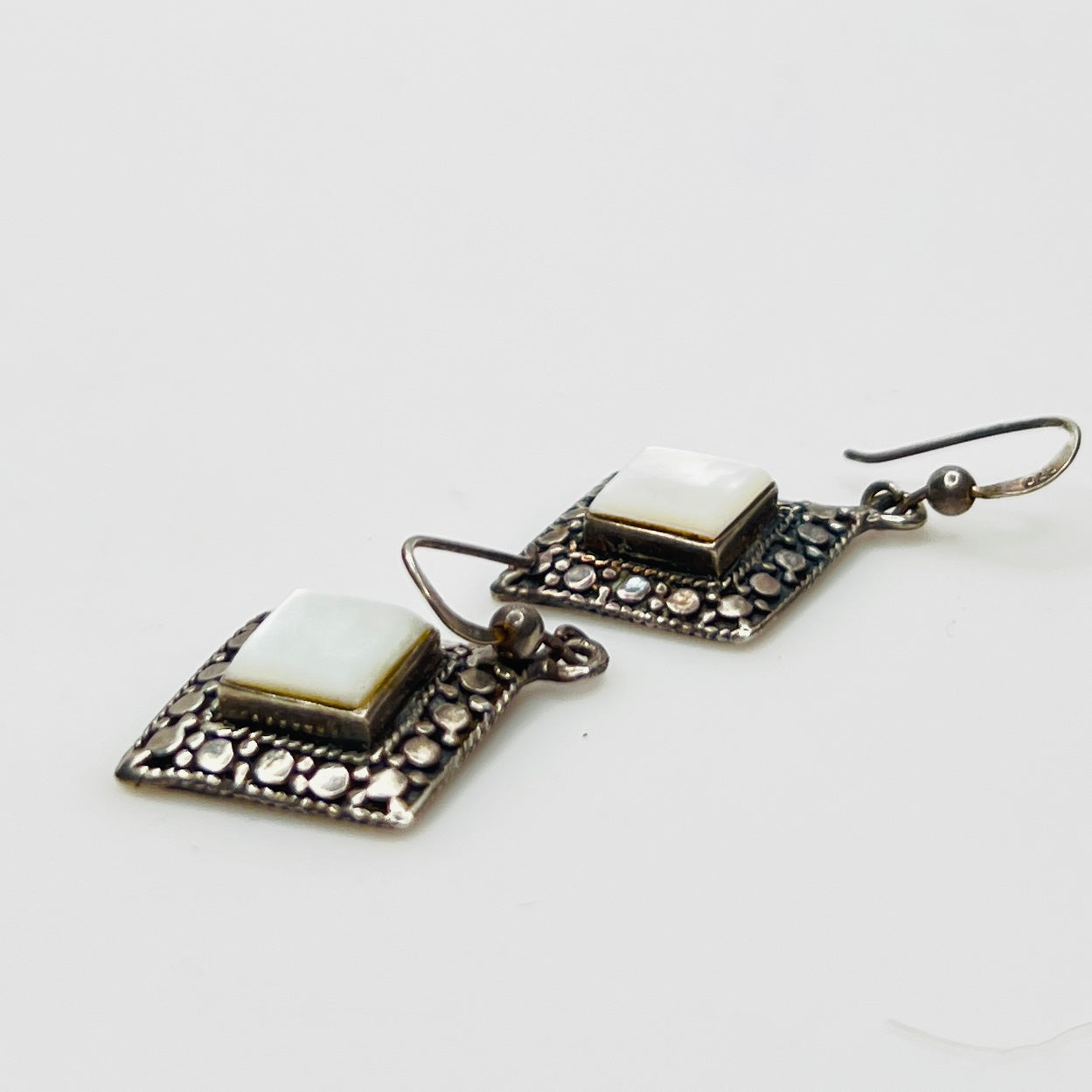 Square mother of pearl drop earrings in oxidized silver