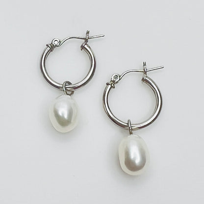 Sterling silver hoop earrings with pearl dangles